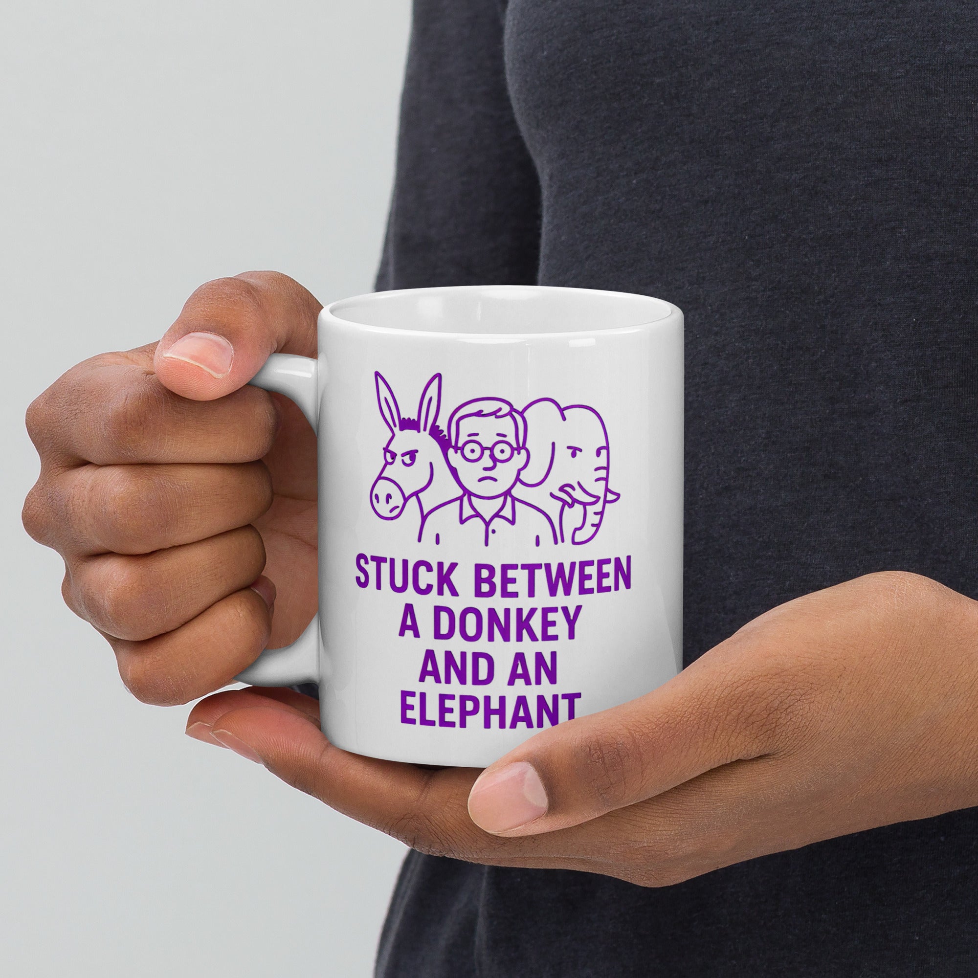 Stuck Between a Donkey and an Elephant - White glossy mug